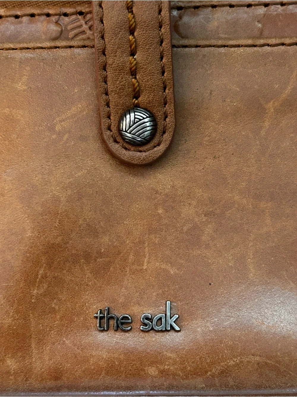 The Sak Smartphone Wristlet Wallet Iris Tobacco Brown Flower Embossed
